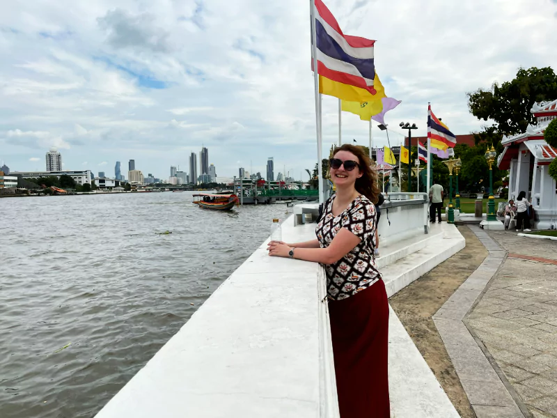 wat arun overlooking river with sarong