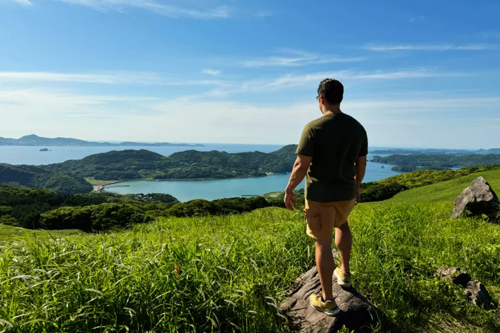 laurens looking out over the hirado bay with its green hills and blue water